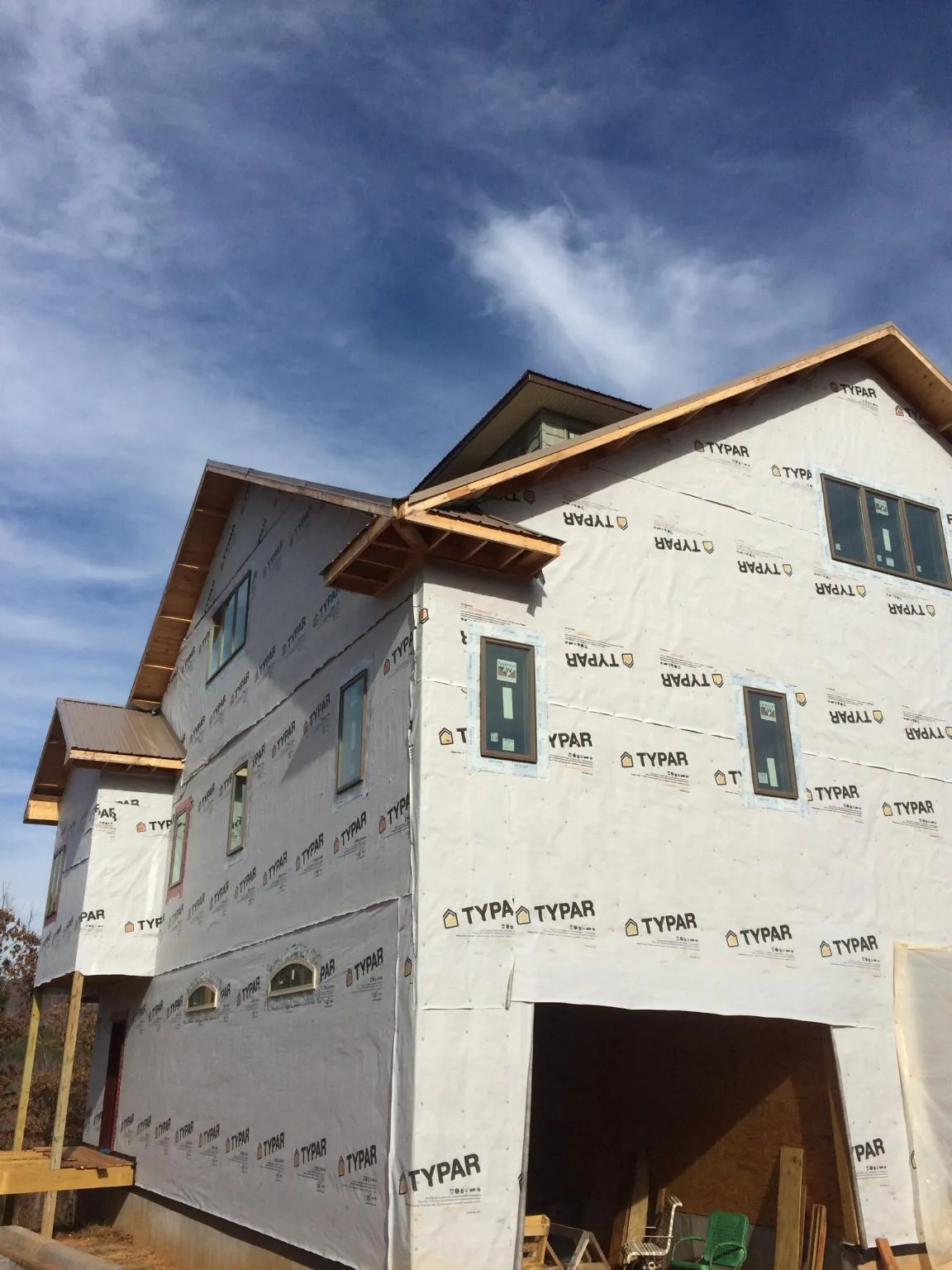 Stick built house wrapped in Typar with new roof framing and dormers in Mackay